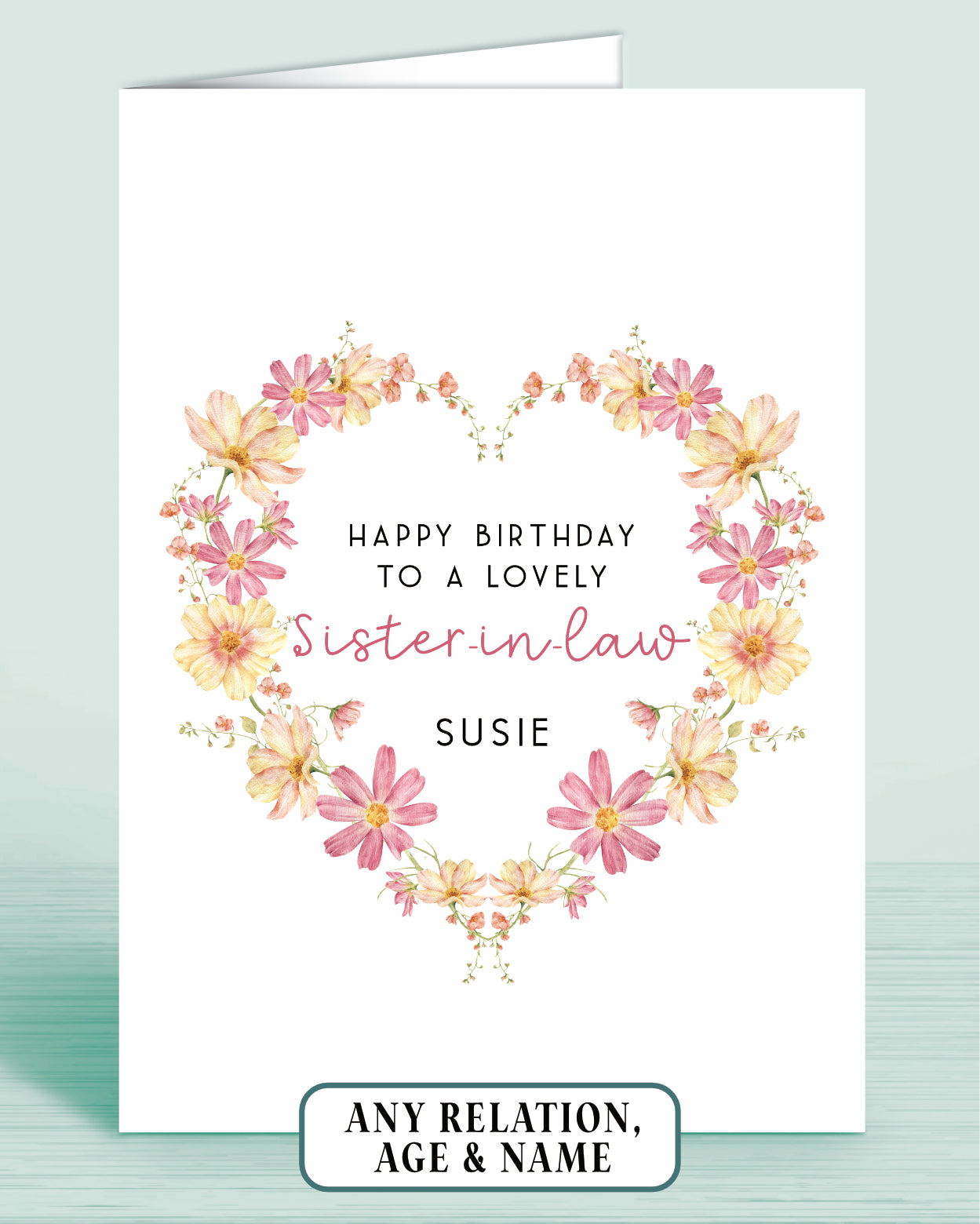 Personalised Pink and yellow floral wreath birthday card for a lovely Sister-in-law with floral design on a white background.
