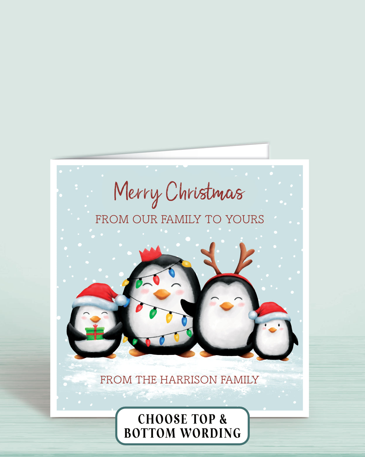 Personalised Christmas card with four cheeky penguins holding christmas lights on a light blue snowy background, 6x6 inches with envelope