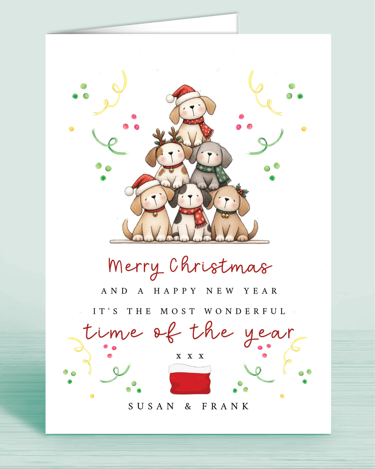 A Dog Lovers christmas card with a stack of christmas tree shaped Puppies and text underneath that reads: Merry Christmas and a happy new year it's the most wonderful time of the year xxx - Name(s) are optional.