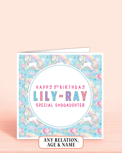 Goddaughter Birthday card with unicorns and rainbow design on a light blue background