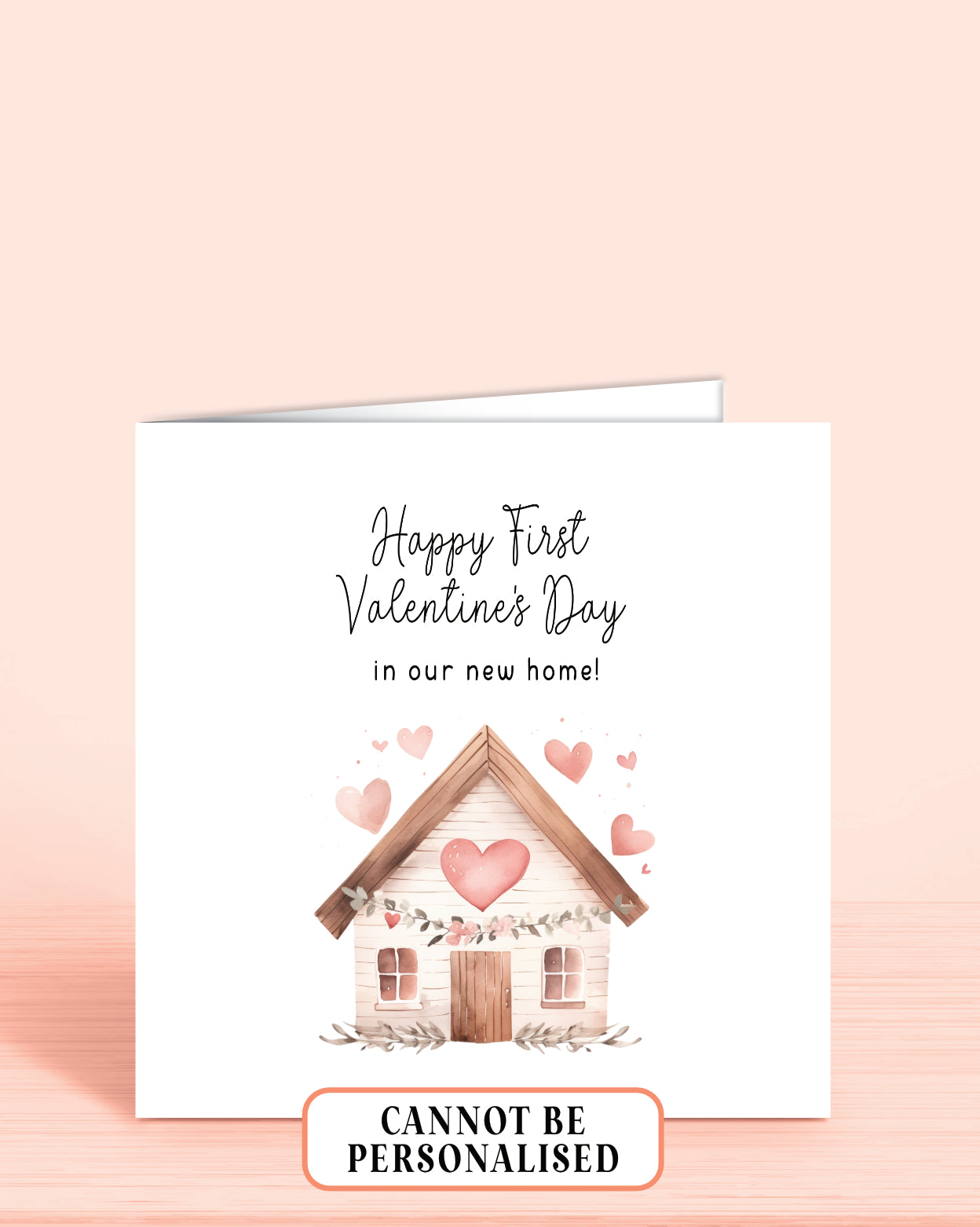 A Valentines Day Card with an illustration of a house and pink hearts and the words: Happy First Valentine's Day in our new home!